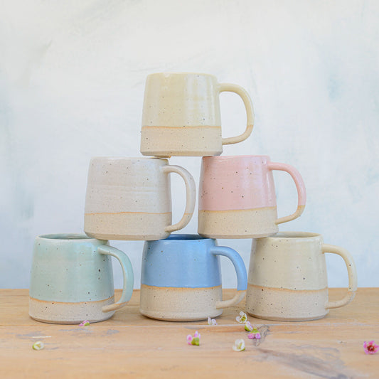Ceramic Mug in White, Yellow, Pink, Blue and Green