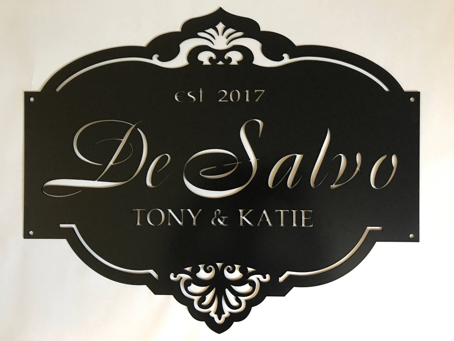 Custom laser cut metal sign with gorgeous detail